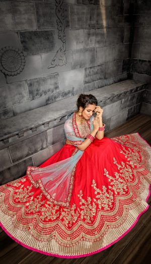 Red Butter Silk Zari, Emroidery and sequenceDesiger Heavy Lahenga Choli.